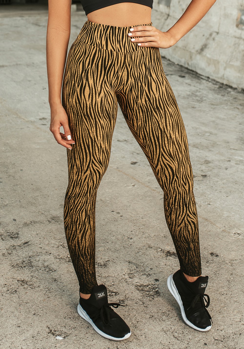 Calça legging jacquard zebra dourado reverse