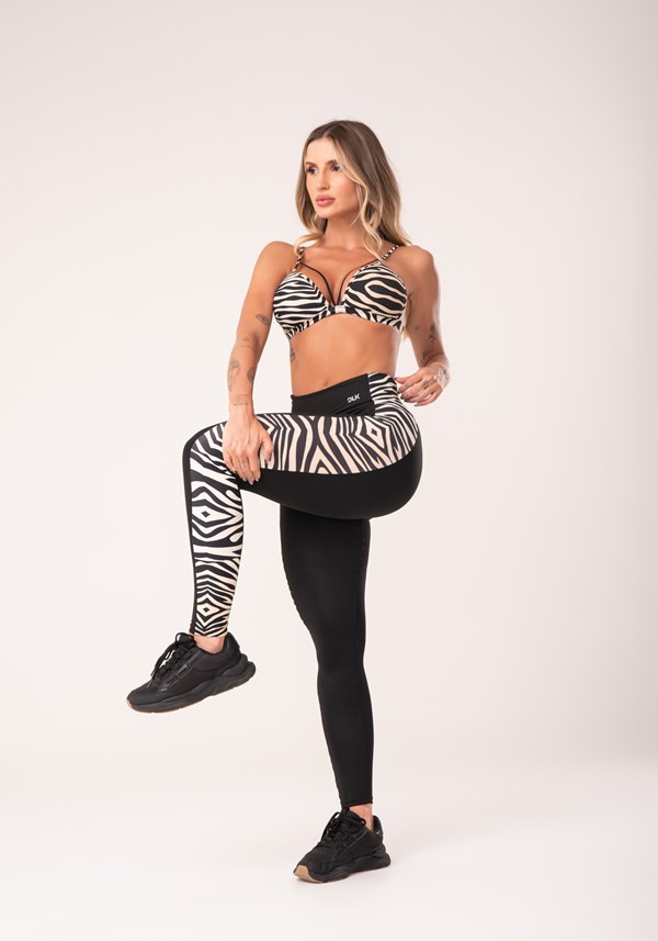 Calça legging wild preta com detalhe lateral zebra bege