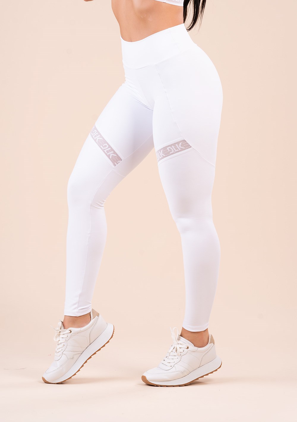 Legging fitness feminina branca com recorte e elástico vazado action