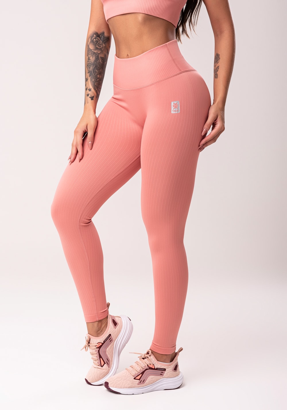 Legging fitness feminina rosé com cós alto e detalhe em v seamless dlk
