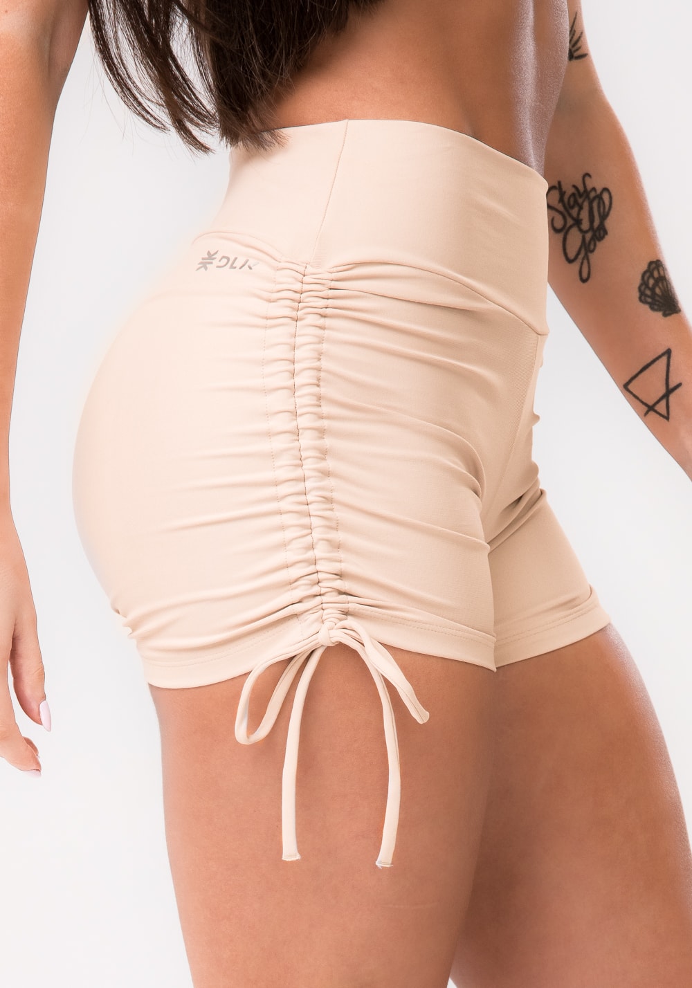 Short fitness feminino nude com amarração aura