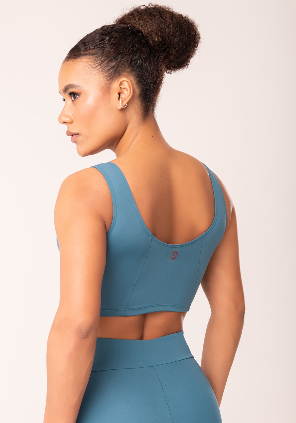 Top cropped fitness feminino azul com recortes oasis dlk