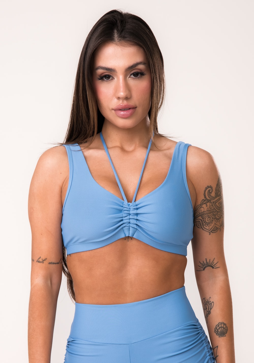 Top fitness feminino azul com franzido e amarração aura