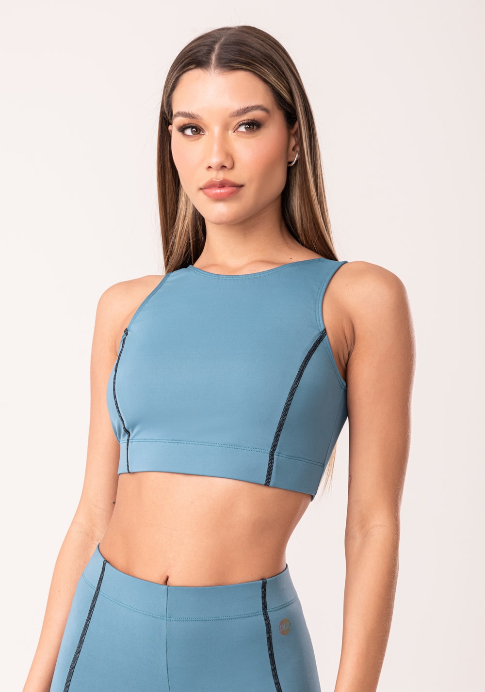 Top fitness feminino azul com pesponto oasis