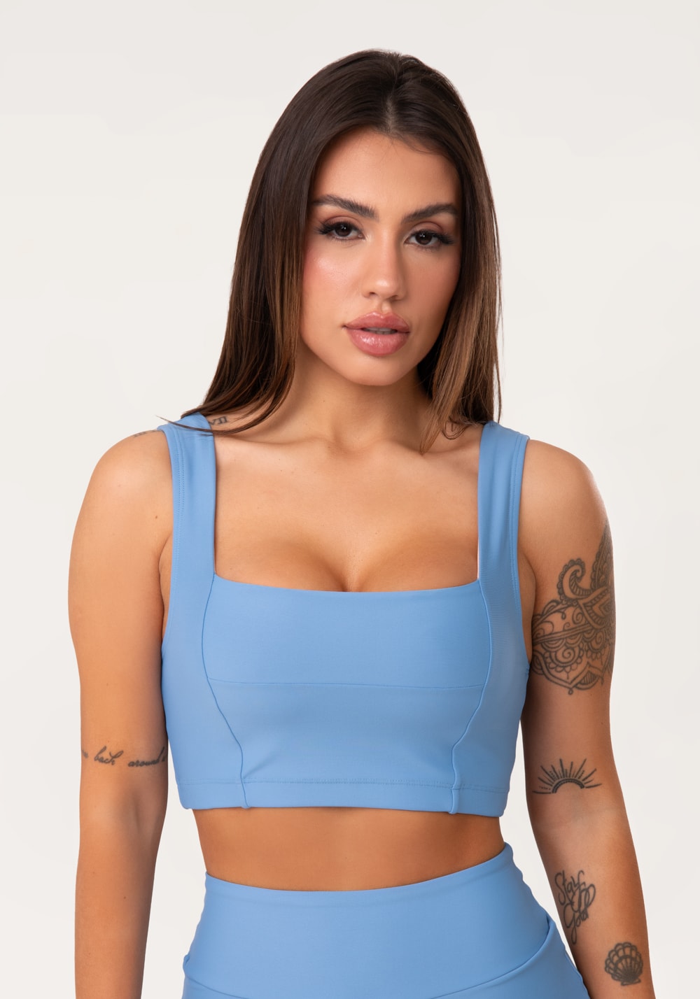 Top fitness feminino azul decote reto com recortes aura