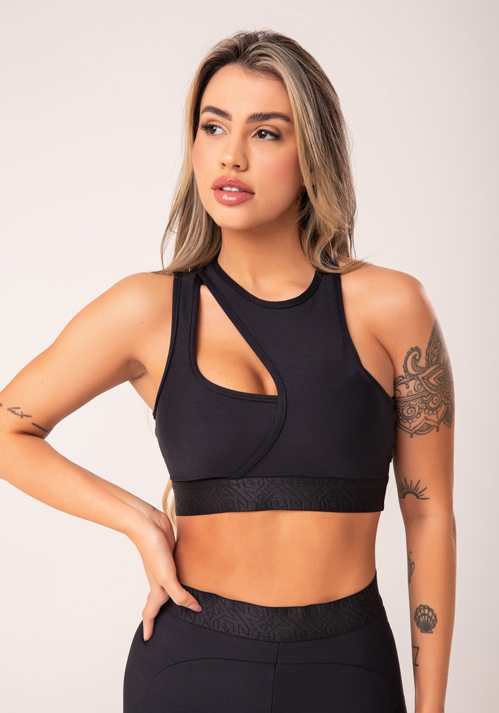 Top fitness feminino preto assimétrico com elástico flow