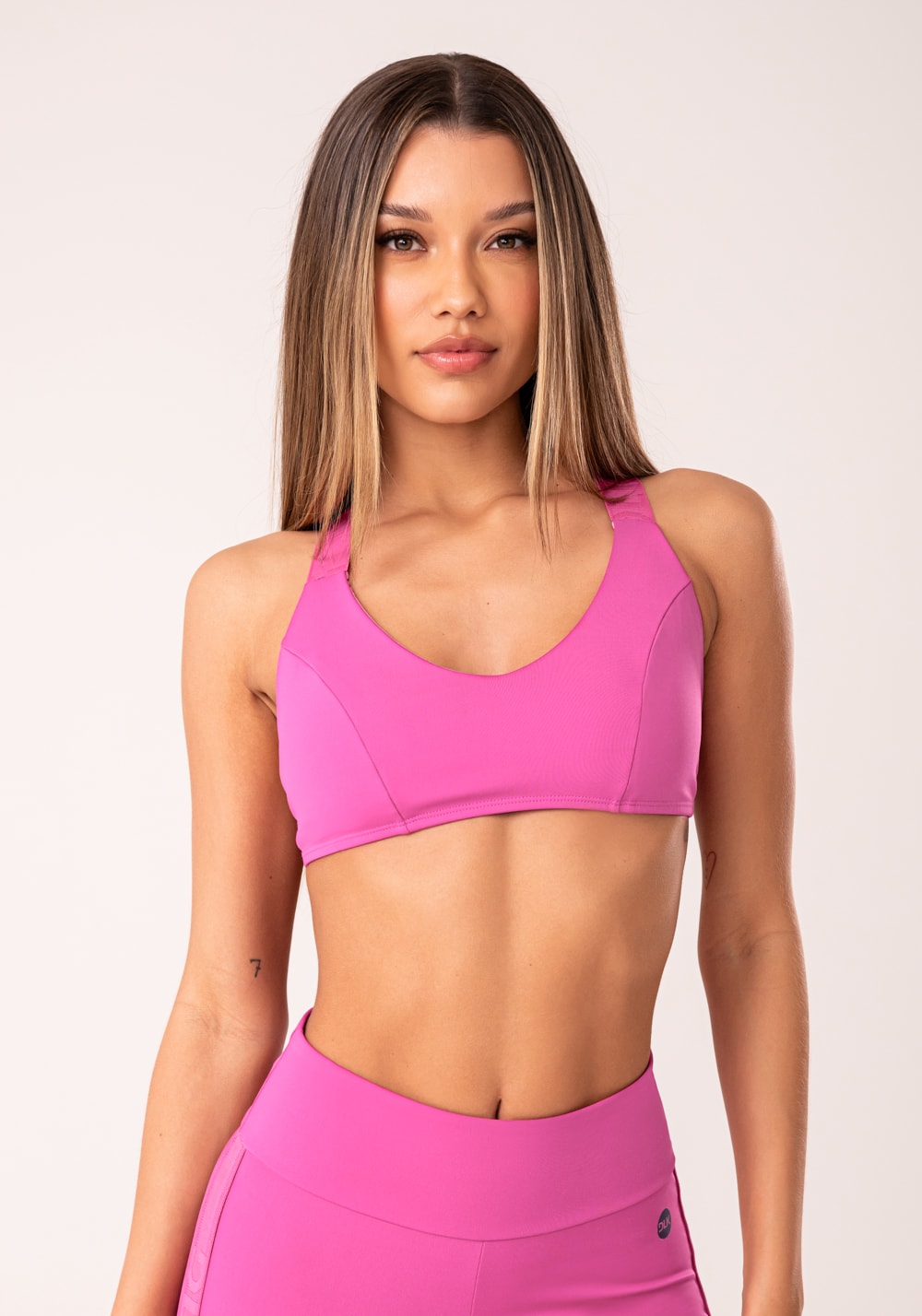 Top fitness feminino rosa com elástico cruzado oasis