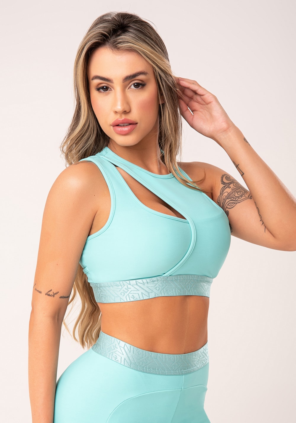 Top fitness feminino verde assimétrico com elástico flow